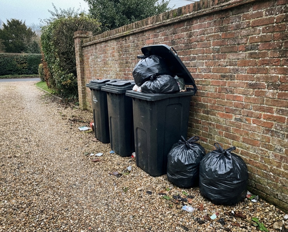 Overflowing wheelie bins in Bersted needing private collection